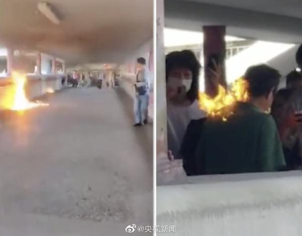 丧心病狂！香港暴徒向市民泼洒液体并引燃