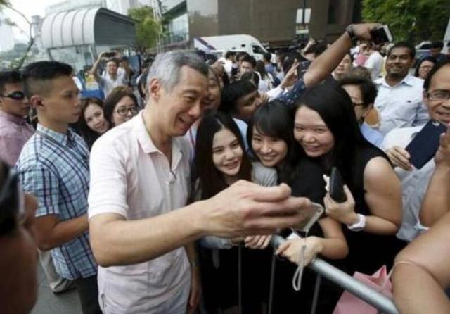 新加坡小女孩隔空喊話總理“什麽時候能上課”，總理回答太暖