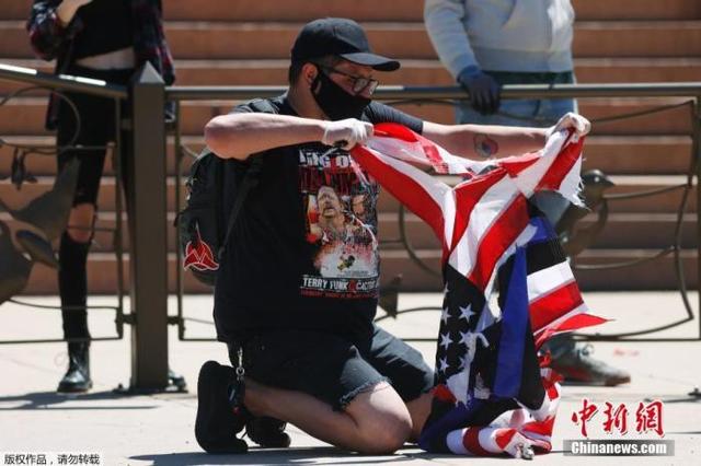 年终观察：旧疾未愈新冠又起“美国梦”为何成了“美国病”？