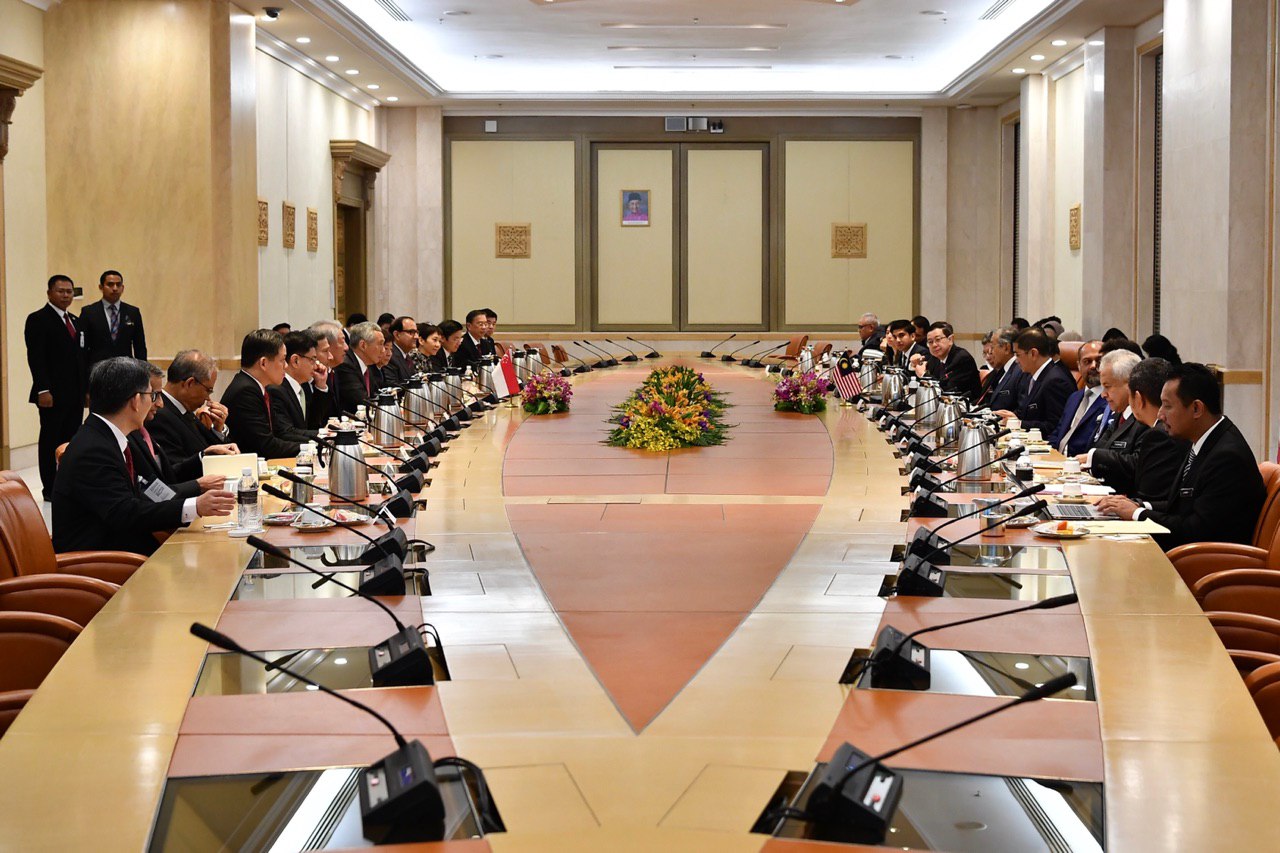 Singapore-Malaysia Leaders' Retreat PM Lee Hsien Loong, Malaysian PM Mahathir Mohamad and delegation from both countries meet at the Perdana Putra Building ST.jpg