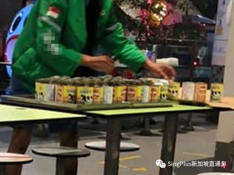 饮料摊将炼乳罐打开放置一夜