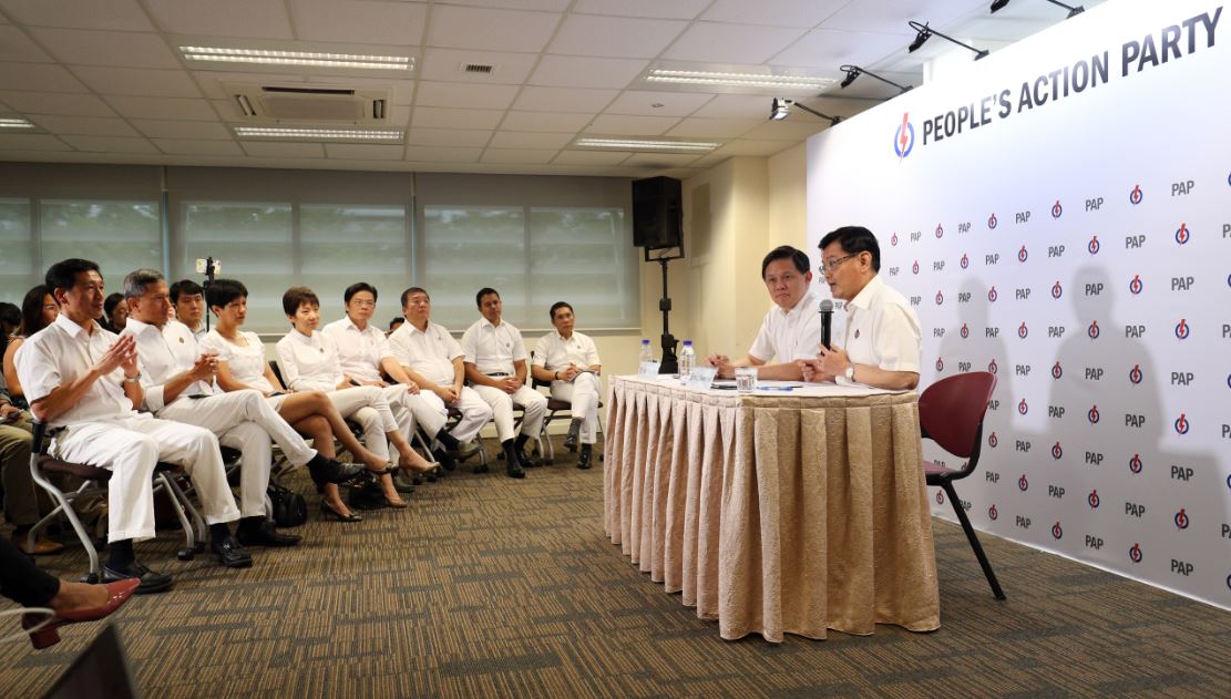 人民行动党于2018年11月23日公布新一届中央执行委员会职务，财政部长王瑞杰（右一）正式出任行动党第一助理秘书长，贸工部长陈振声（右二）担任第二助理秘书长，两人在行动党总部共同主持记者会，分享他们对于未来领导新加坡所持的愿景。