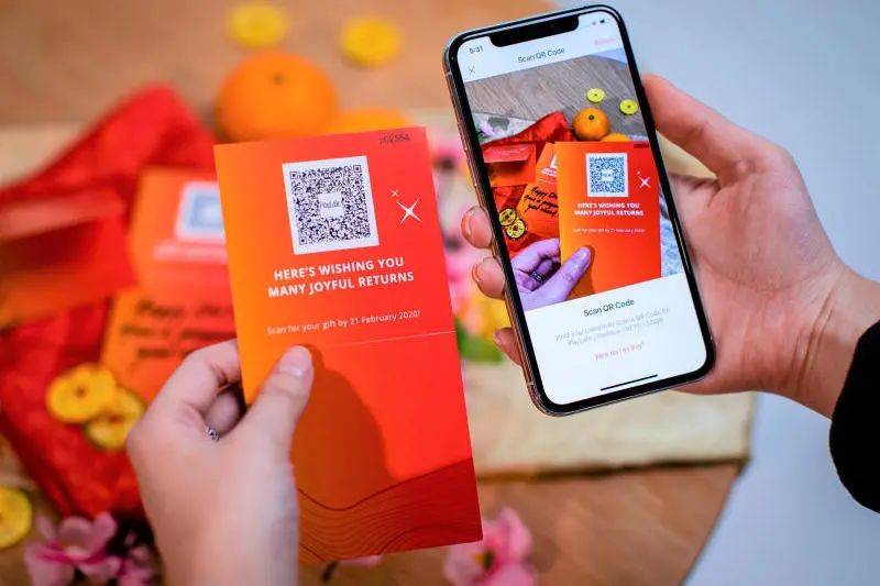 狮城热点 新加坡金管局鼓励民众使用电子红包