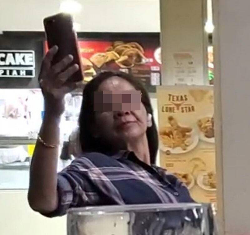 掌掴啤酒女 醉嫂被警逮