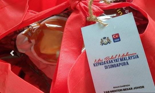 援助滞留新国越堤族 州政府再派1000食物篮