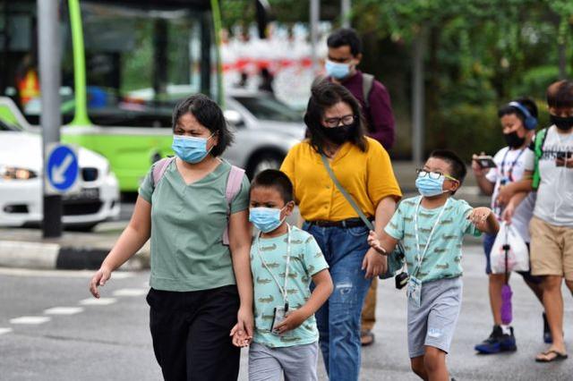 又一国“沦陷”！新冠变异新毒株导致感染增加，新加坡关闭学校