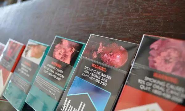 新加坡烟盒恶心图案放大，而且长一模一样，你会戒烟么？