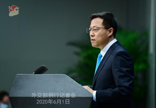 中国和新加坡于6月初启动便利两国必要商务和公务人员往来的“快捷通道”，外交部回应